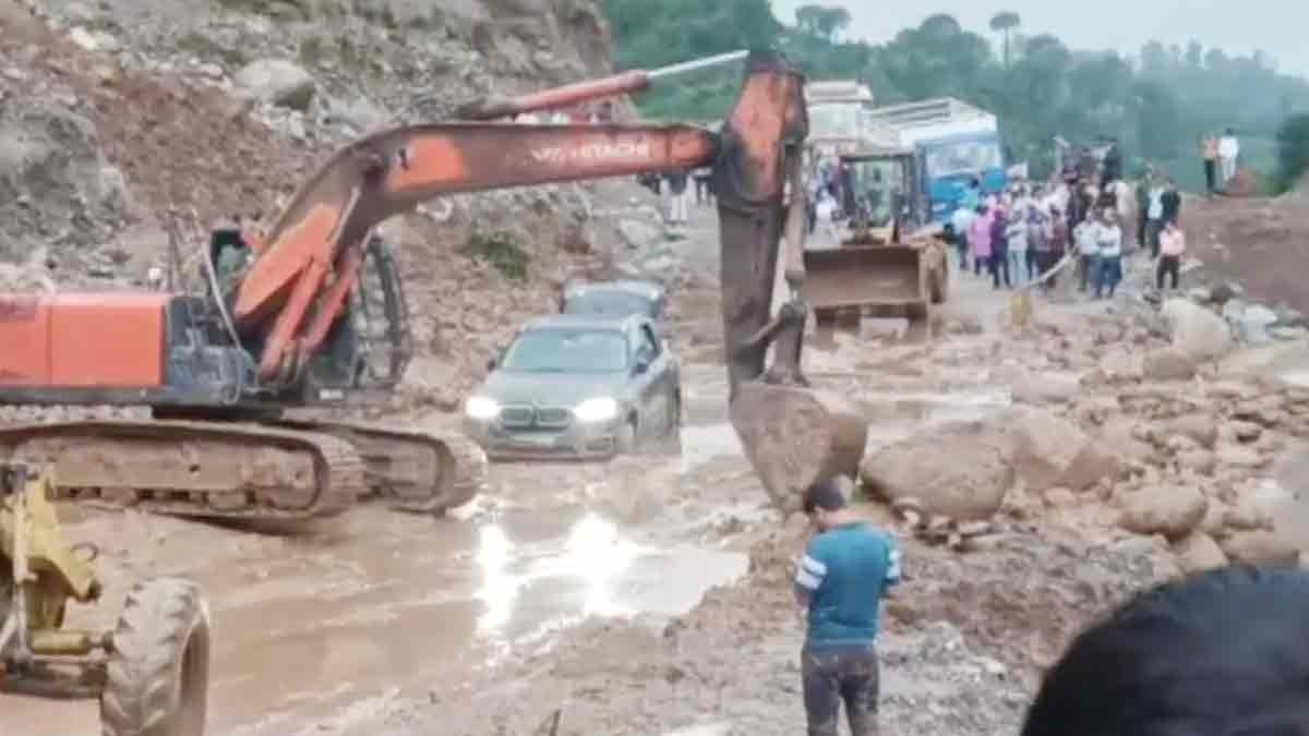  A BMW car was trapped in the debris of a landslide on Pathankot Mandi NH 