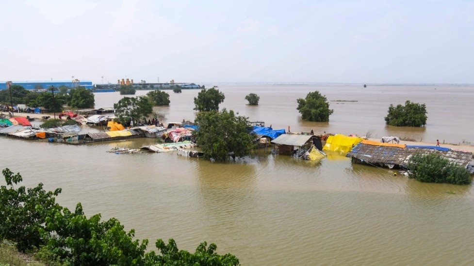 Partially submerged houses at Bind Toli area during the monsoon season, in Patna (PTI File Photo) 