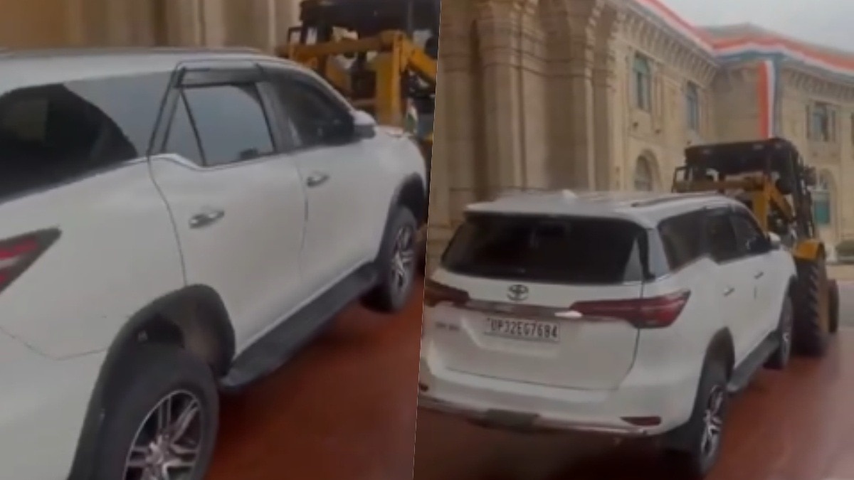 Traffic police took away minister's Fortuner with a crane (Photo: screengrab)