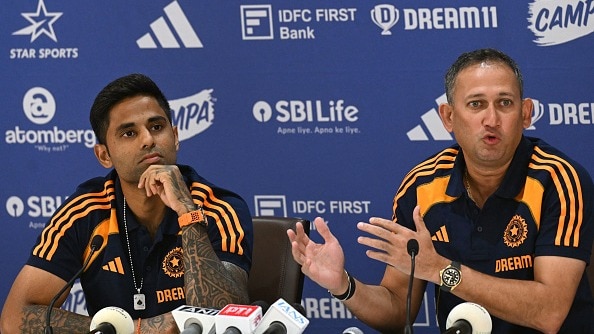 Indian cricket captain Suryakumar Yadav (L) and Ajit Agarkar chairman of Board of Control for Cricket in India (BCCI) selection committee