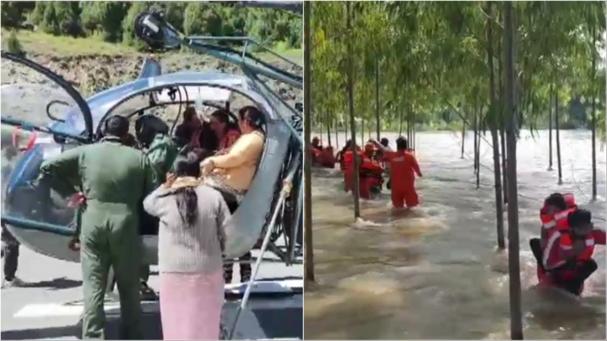 जलप्रहार के बीच रेस्क्यू ऑपरेशन की तस्वीर हिमाचल प्रदेश के कांगड़ा की है