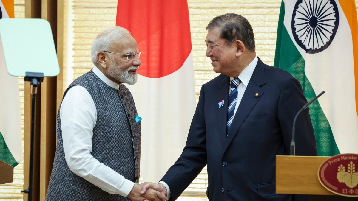Indian Prime Minister Narendra Modi (left) and Japanese Prime Minister Shigeru Ishiba address a joint press conference in Tokyo