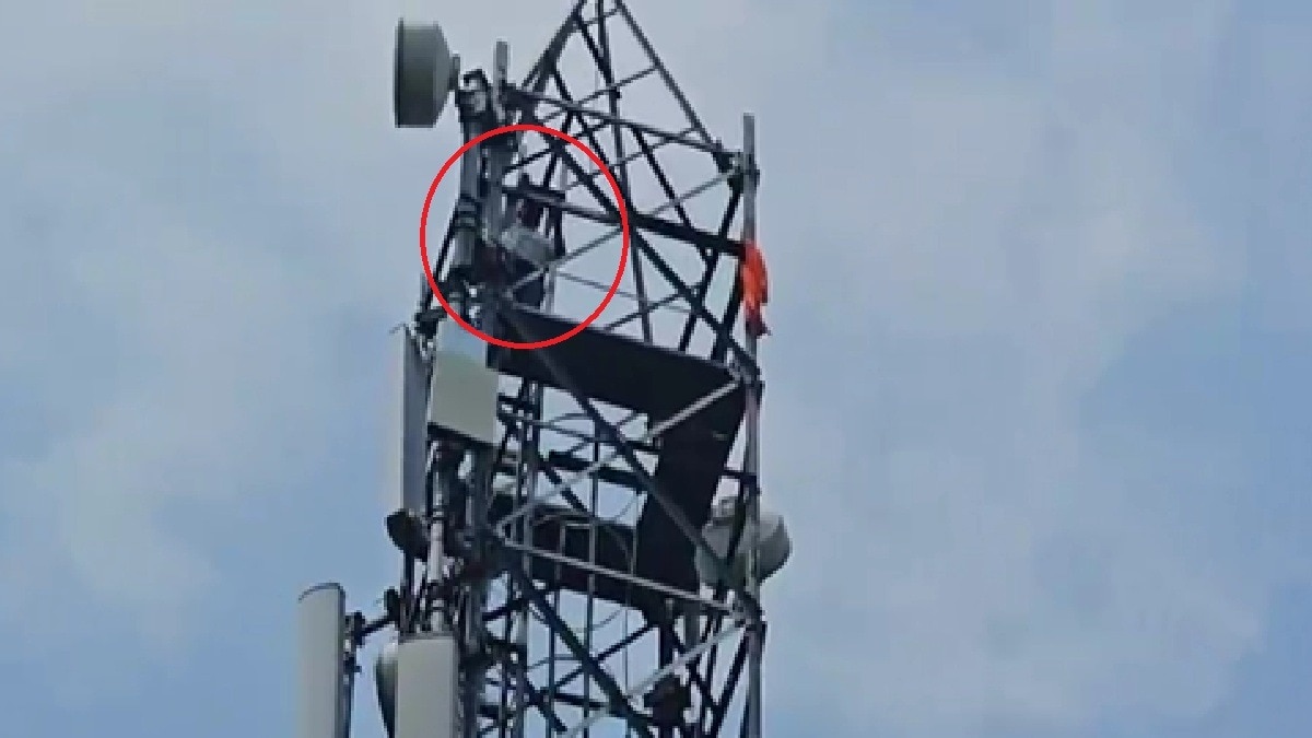 Man climbs on tower
