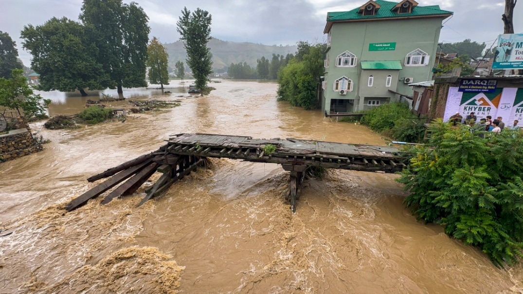 The Jhelum river flows in spate after heavy rainfall, in Anantnag, Jammu and Kashmir (PTI Photo)