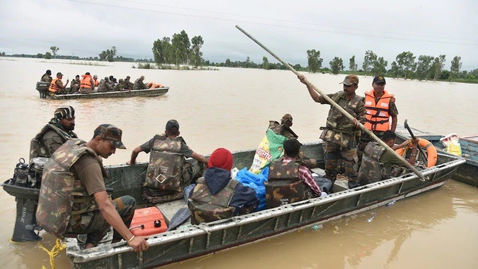 People are being rescued by boat in Punjab (Photo: PTI)