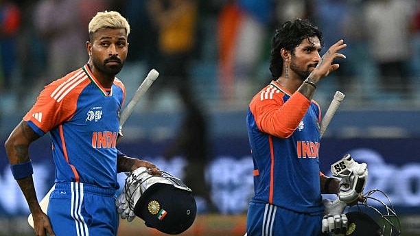 Hardik Pandya and Tilak Verma returning to the pavilion after victory against Pakistan