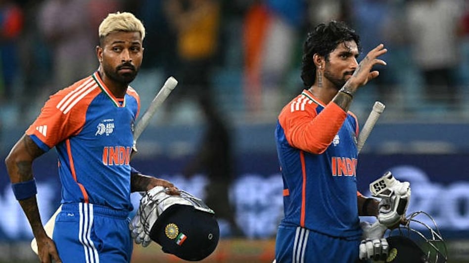 Hardik Pandya and Tilak Verma returning to the pavilion after victory against Pakistan Hardik Pandya and Tilak Verma returning to the pavilion after victory against Pakistan