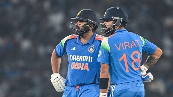 India's Virat Kohli (R) and Rohit Sharma