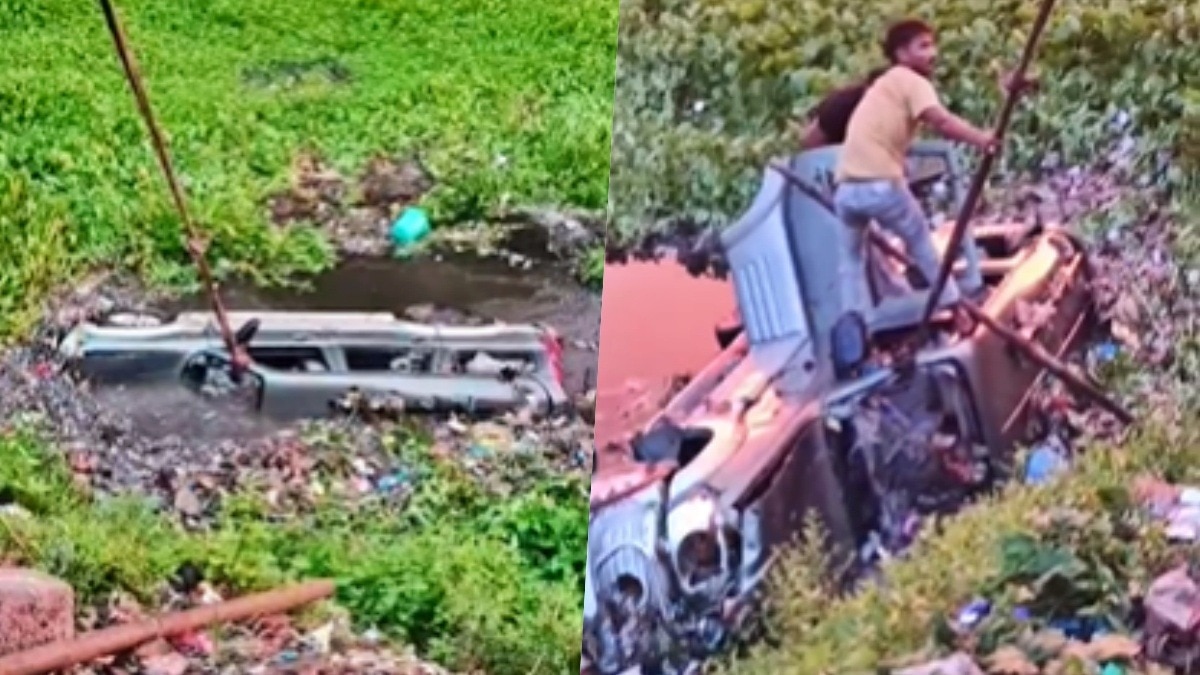 तालाब से स्कॉर्पियो को निकालते लोग (Photo- Screengrab)