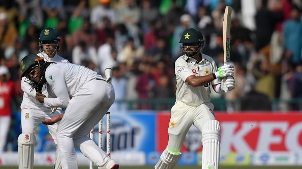 Pakistan's Babar Azam (R) in action in this frame