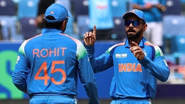 India's Virat Kohli (R) and Rohit Sharma