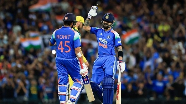 Rohit Sharma of India (L) celebrates with Virat Kohli