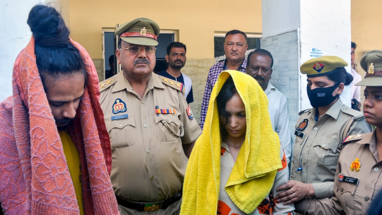 Police take away Muskan and her lover Sahil after they were arrested in connection with Saurabh's murder. (PTI photo)