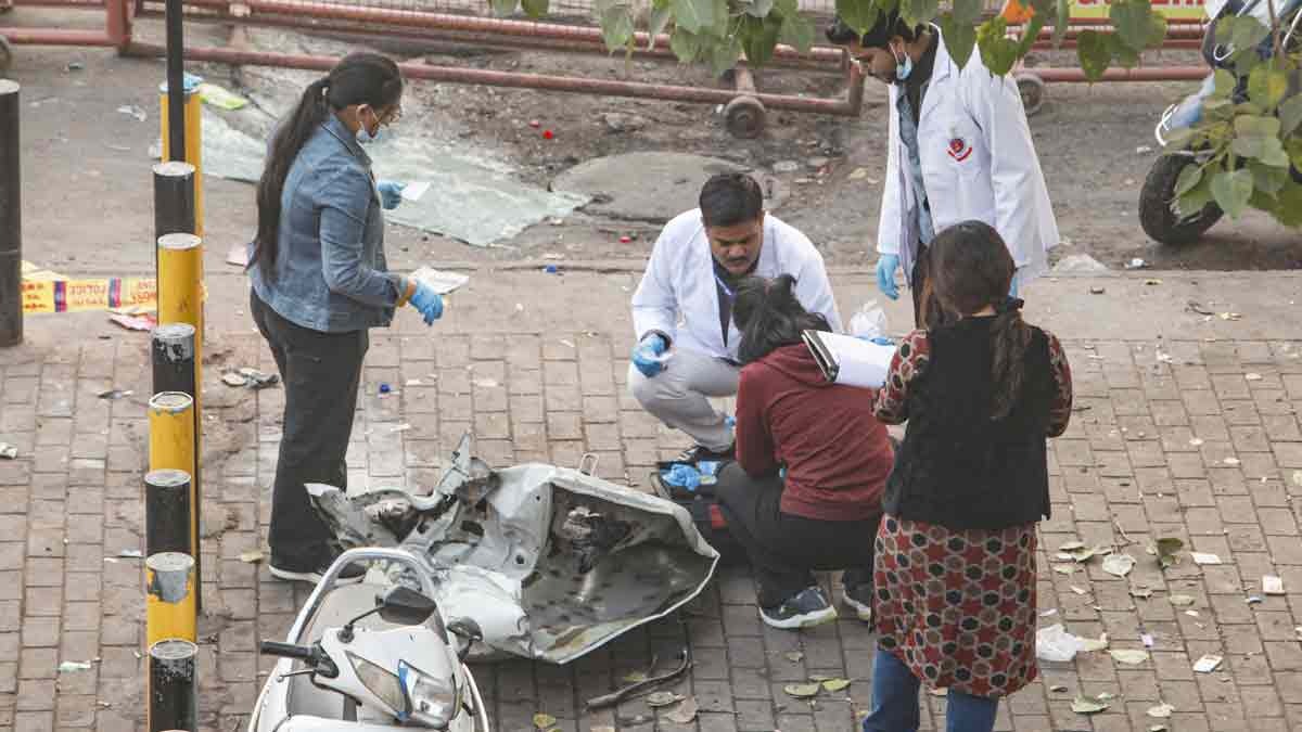 Forensic officials collect evidences