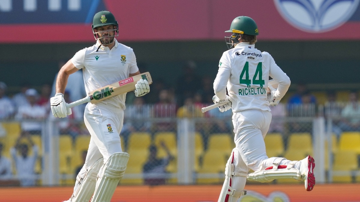  South Africa's Aiden Markram (L) and Ryan Rickelton