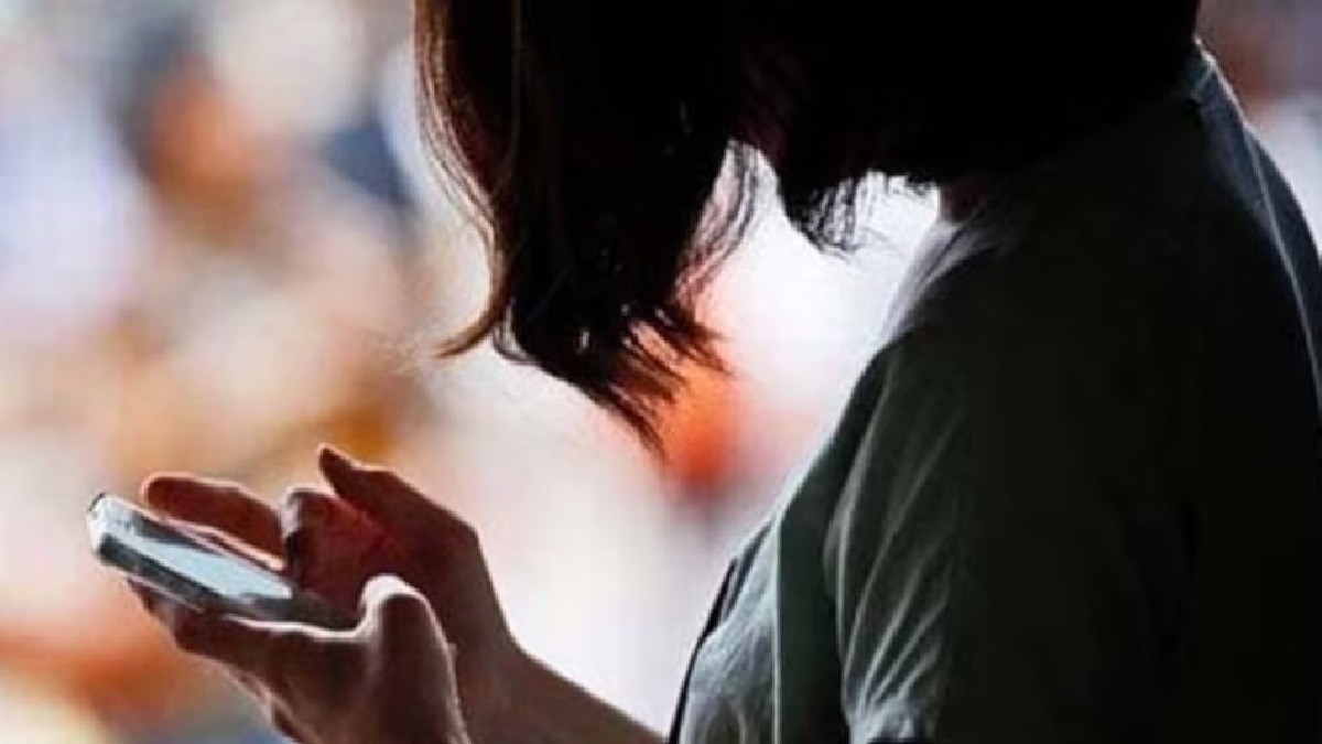 woman holding mobile