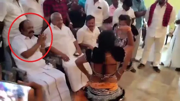 Tamil Nadu Minister S Periyakaruppan was seen enjoying himself by clapping at the obscene dance