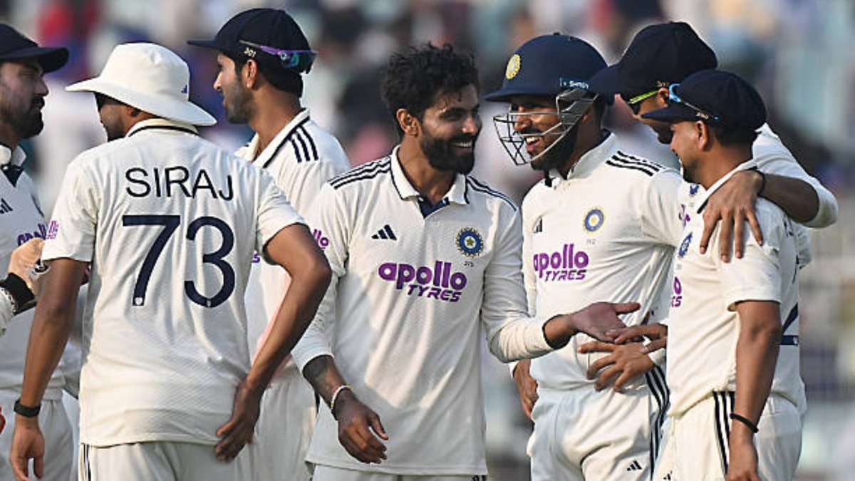 Ravindra Jadeja (2R) of India celebrates the wicket of Tony de Zorzi of South Africa with teammates during the First Test match in the series between India and South Africa