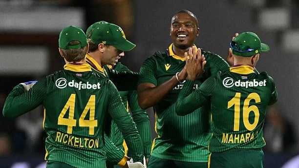 South Africa's Lungi Ngidi (C) celebrates with teammates