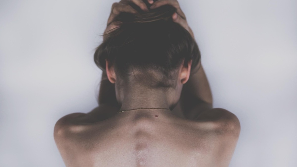 woman suffering from pain