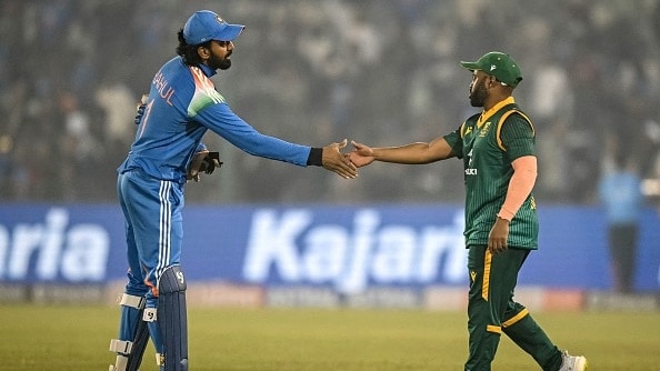 India's captain KL Rahul (L) shakes hands with his South African counterpart Temba Bavuma