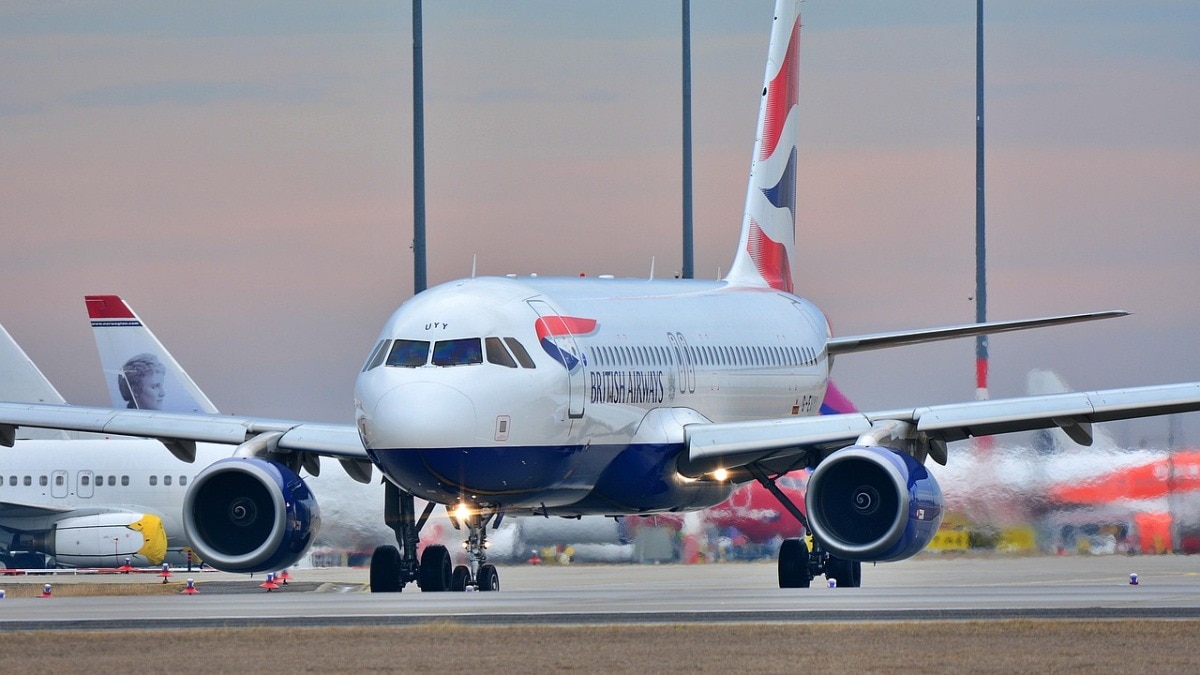 Cathay Pacific passenger opens door
