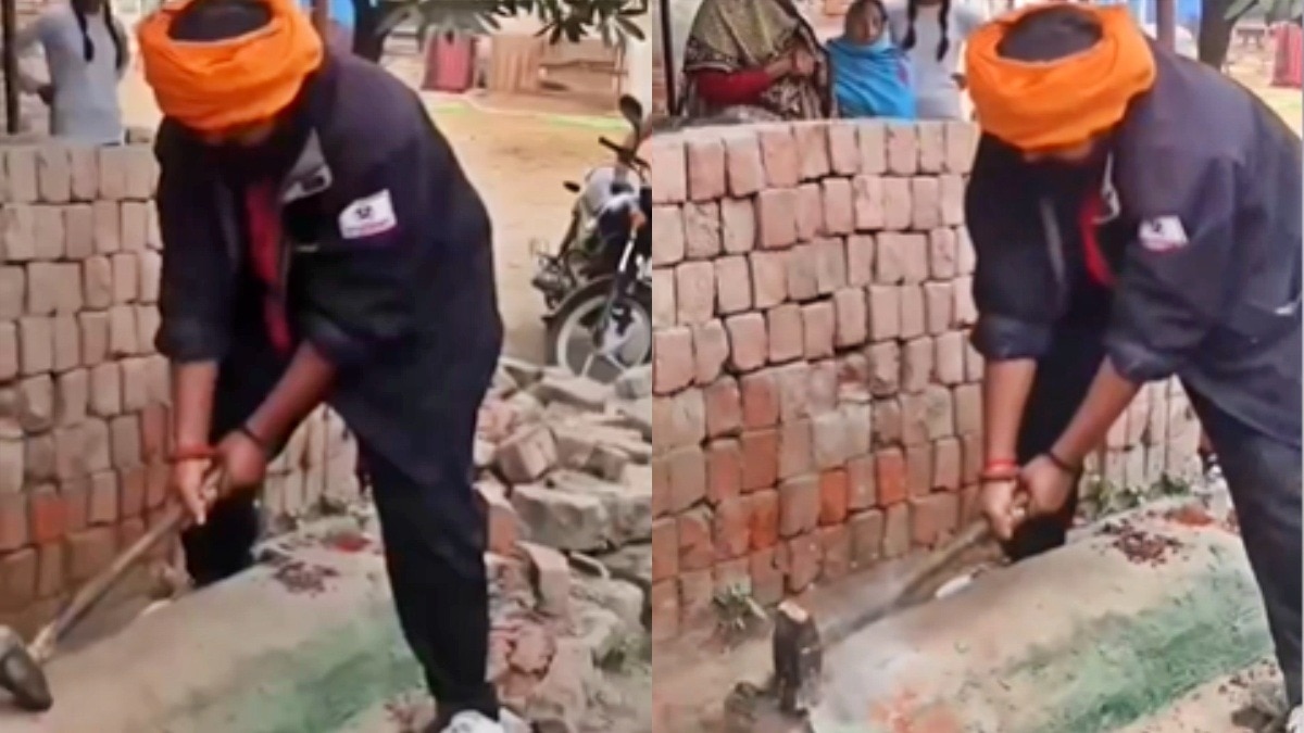 Bajrang Dal activist demolishing shrine in Fatehpur (Photo - Screengrab)