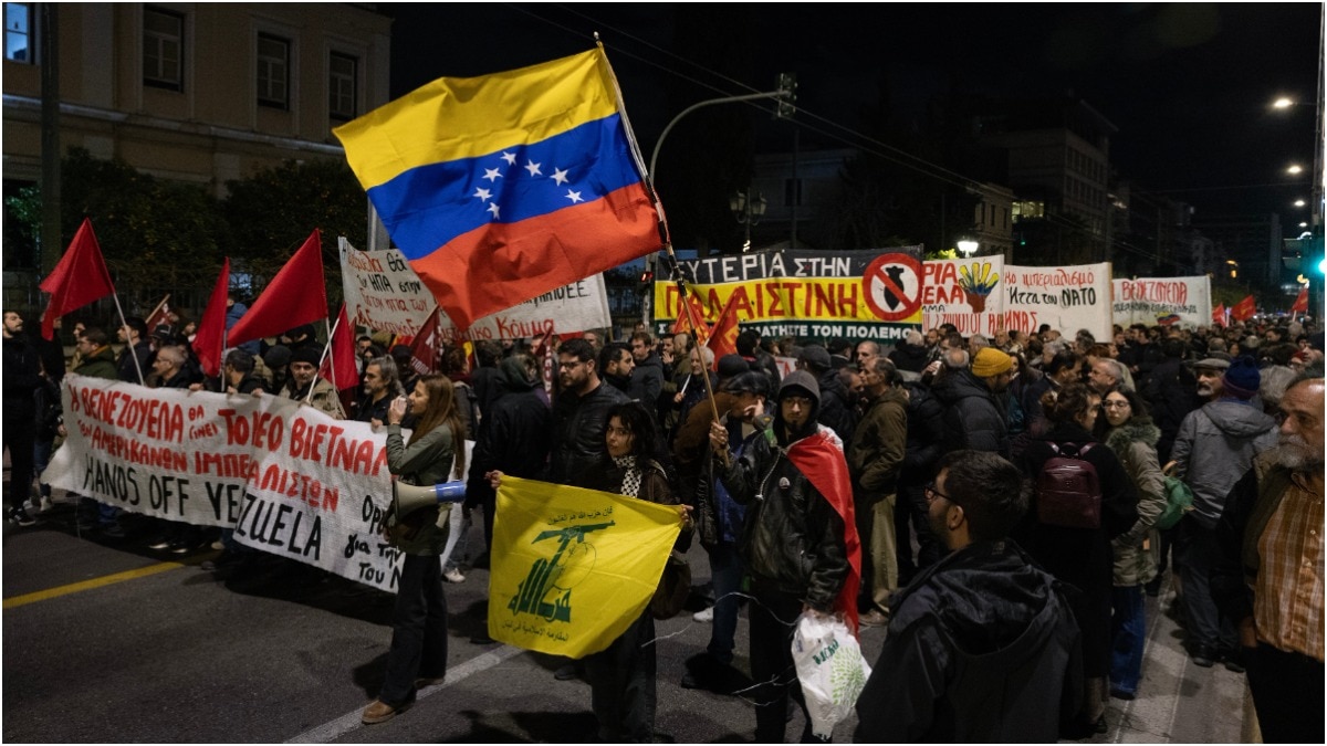 Protesters march opposing the United States strikes on Venezuela and the capture of President Nicolas Maduro, outside the U.S embassy in Athens, Greece