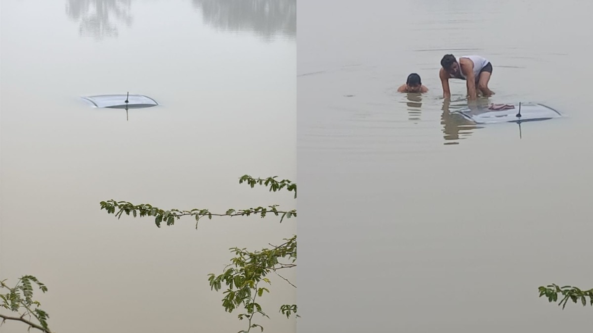लोगों की मदद से कार को तालाब से बाहर निकाला.(Photo: Siddhartha Gupta/ITG)