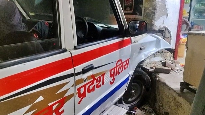 Baghpat drunk man crashed police car into shop. (Photo - Screengrab)