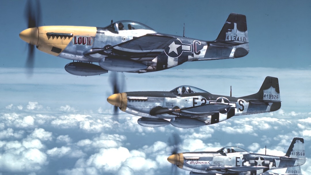 World War 2-era P-51 Mustang fighter-bombers of the US Army Air Force flying in formation. Planes like these were made of aluminium, which would have required supplies of cryolite from Greenland.