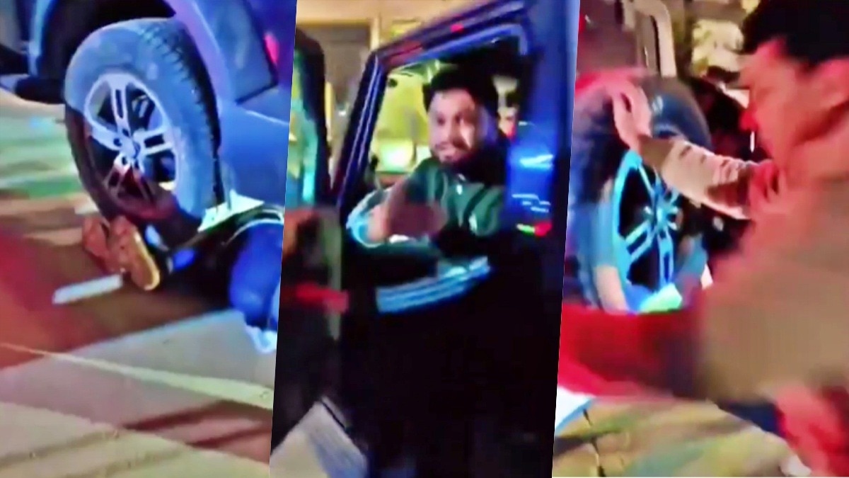 man trapped under Thar vehicle in Lucknow (Photo - Screengrab)