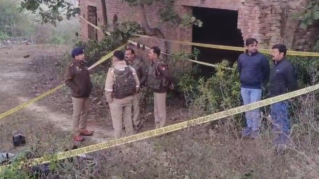 Police officers at the encounter site (Photo- Screengrab)
