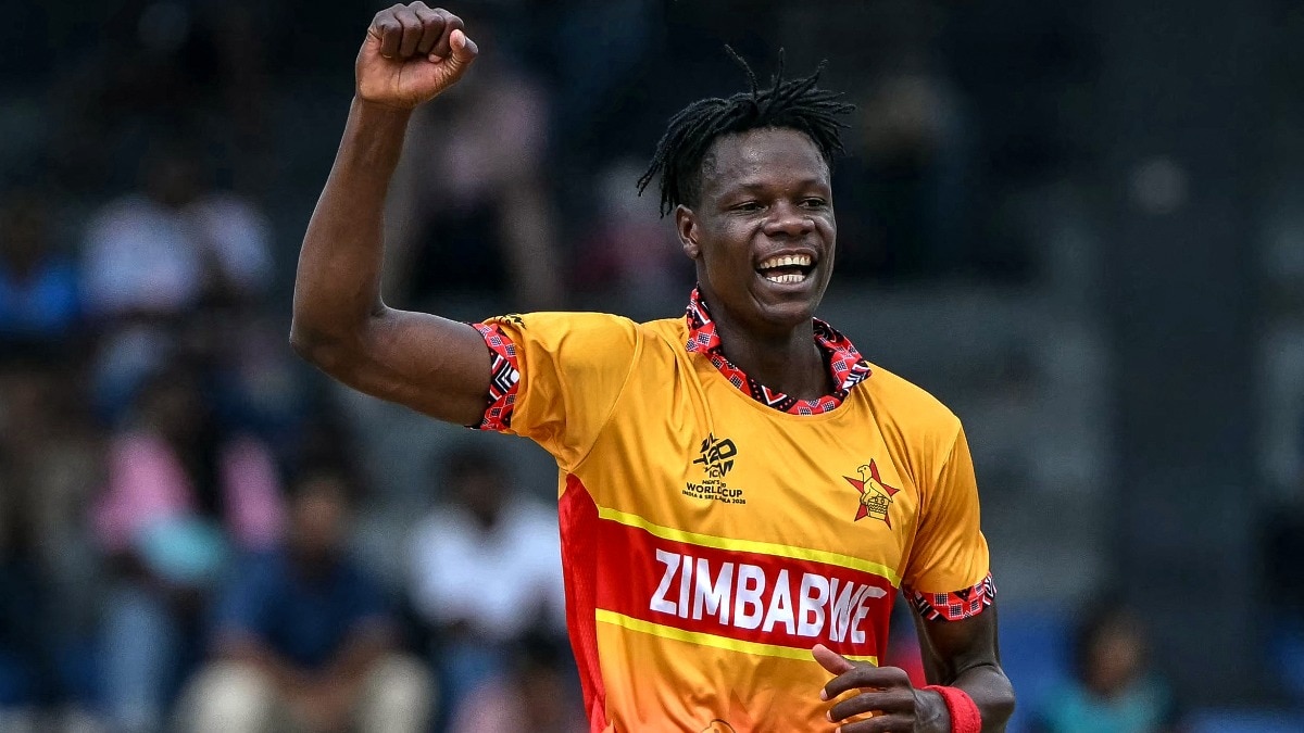 Zimbabwe's Blessing Muzarabani celebrates after taking the wicket of Australia's Adam Zampa during the 2026 ICC Men's T20 Cricket World Cup group stage match between Australia and Zimbabwe at the R Premadasa Stadium in Colombo