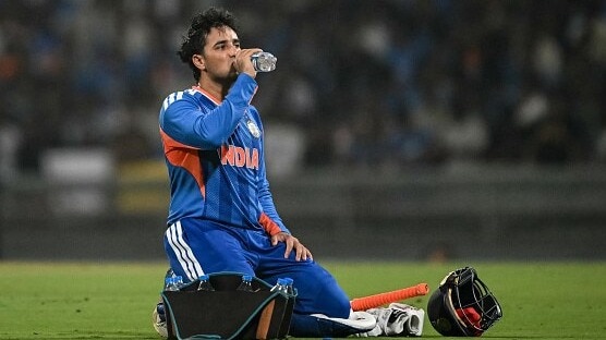 Abhishek Sharma drinks water during a break in the 2026 ICC Men's T20 Cricket World Cup