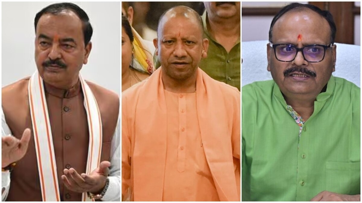 Uttar Pradesh Chief Minister Yogi Adityanath (M), Deputy Chief Minister Keshav Prasad Maurya (L) and Brajesh Pathak