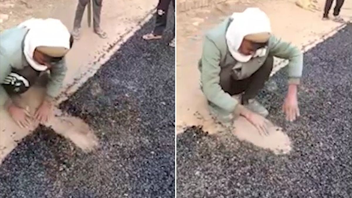 हाथों से ही उखड़ने लगा डामर रोड. (Photo: Screengrab)