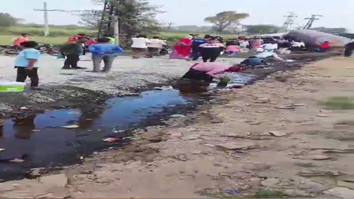 A tanker full of edible oil overturned 