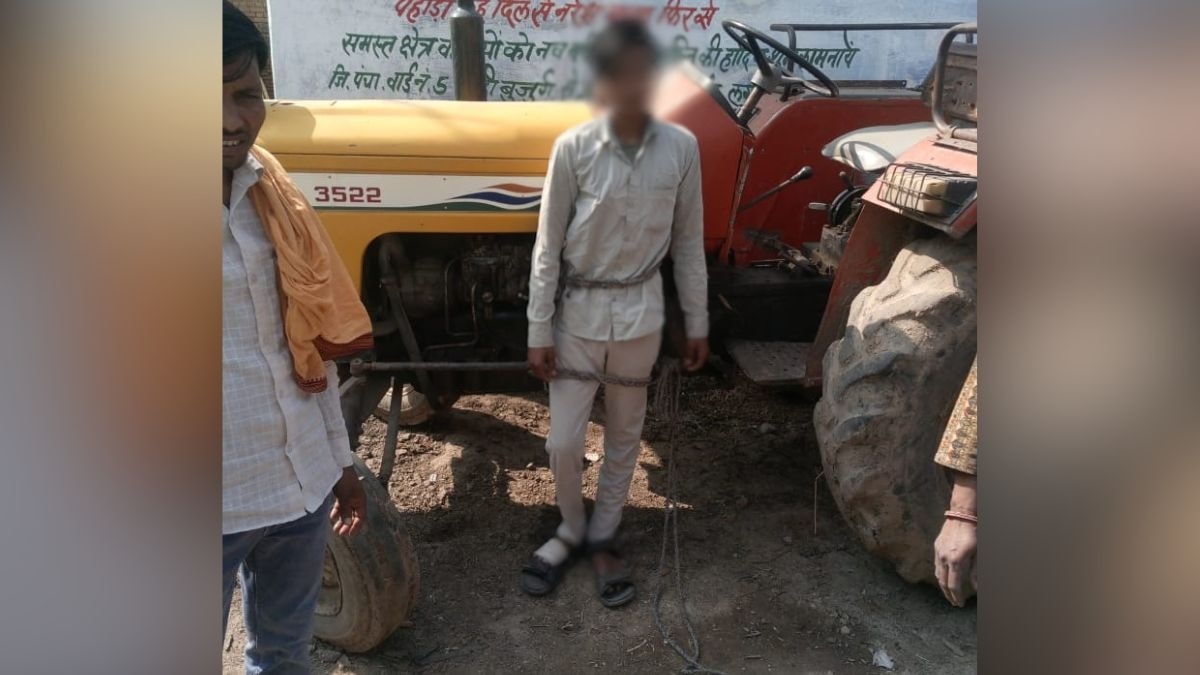 झांसी में दबंगों की गुंडागर्दी... चोरी के शक में युवक को ट्रैक्टर से बांधकर पीटा