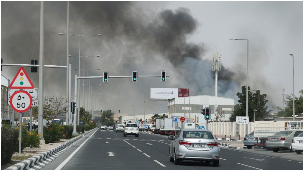 Smoke rises after Iranian missile attacks in Doha, the capital of Qatar.
