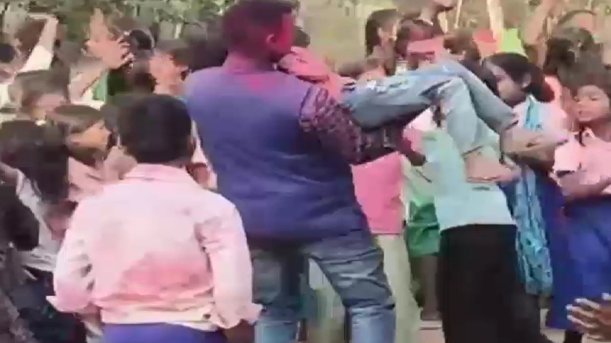 Master dancing with girl students on obscene songs