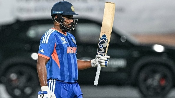 India's Sanju Samson celebrates after scoring a half-century (50 runs)