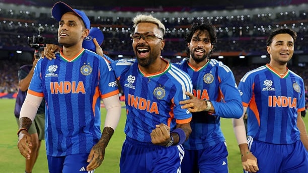 Suryakumar Yadav, Hardik Pandya, Tilak Varma and Abhishek Sharma of India celebrate victory after the ICC Men's T20 World Cup