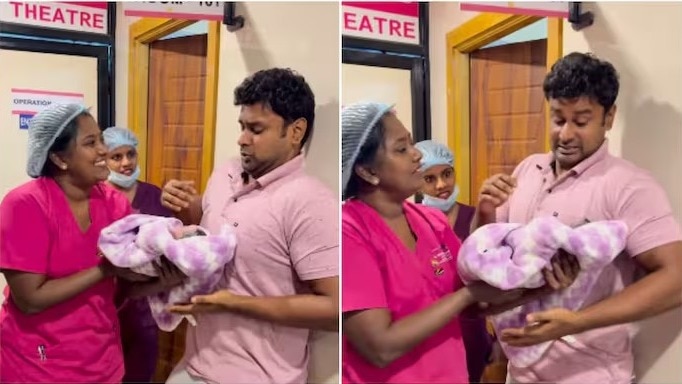 father-holds-newborn-first-time-hands-tremble-emotional-video