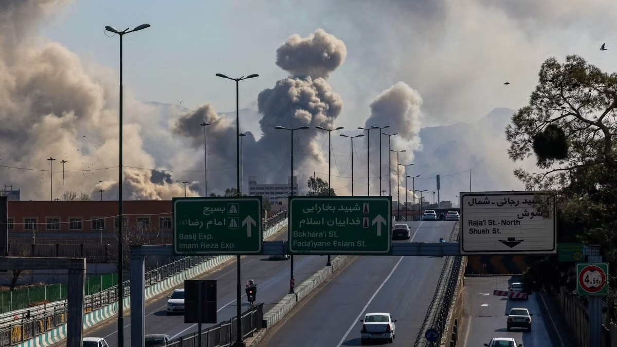 smoke rising over Tehran following military strikes conducted by the U.S. and Israel