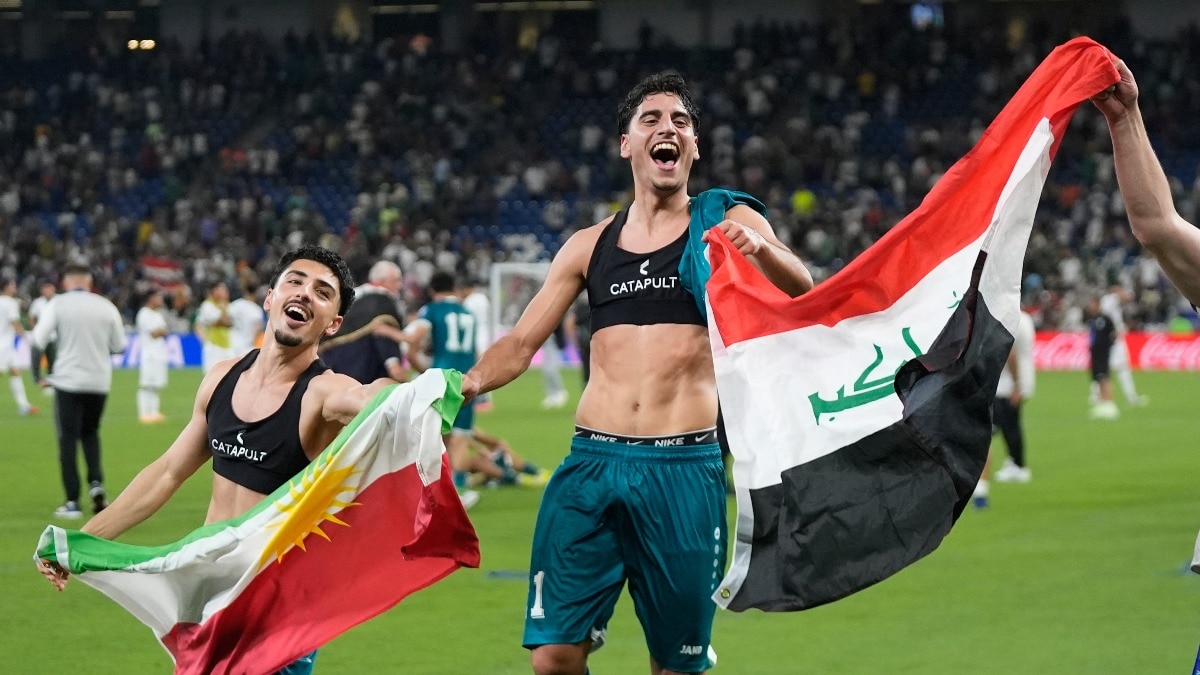Iraq's players celebrate after the World Cup playoff final soccer match between Iraq and Bolivia.