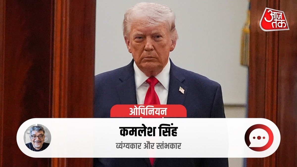 US President Donald Trump enters the Oval Office from the Cross Hall of the White House
