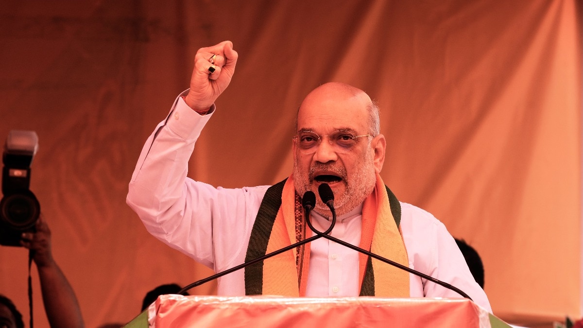 बंगाल में चुनावी रैली के दौरान अमित शाह ने ममत बनर्जी पर निशाना साधा. (Photo: PTI)