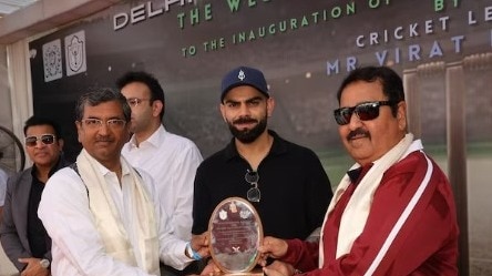 Virat Kohli and coach Rajkumar Sharma.