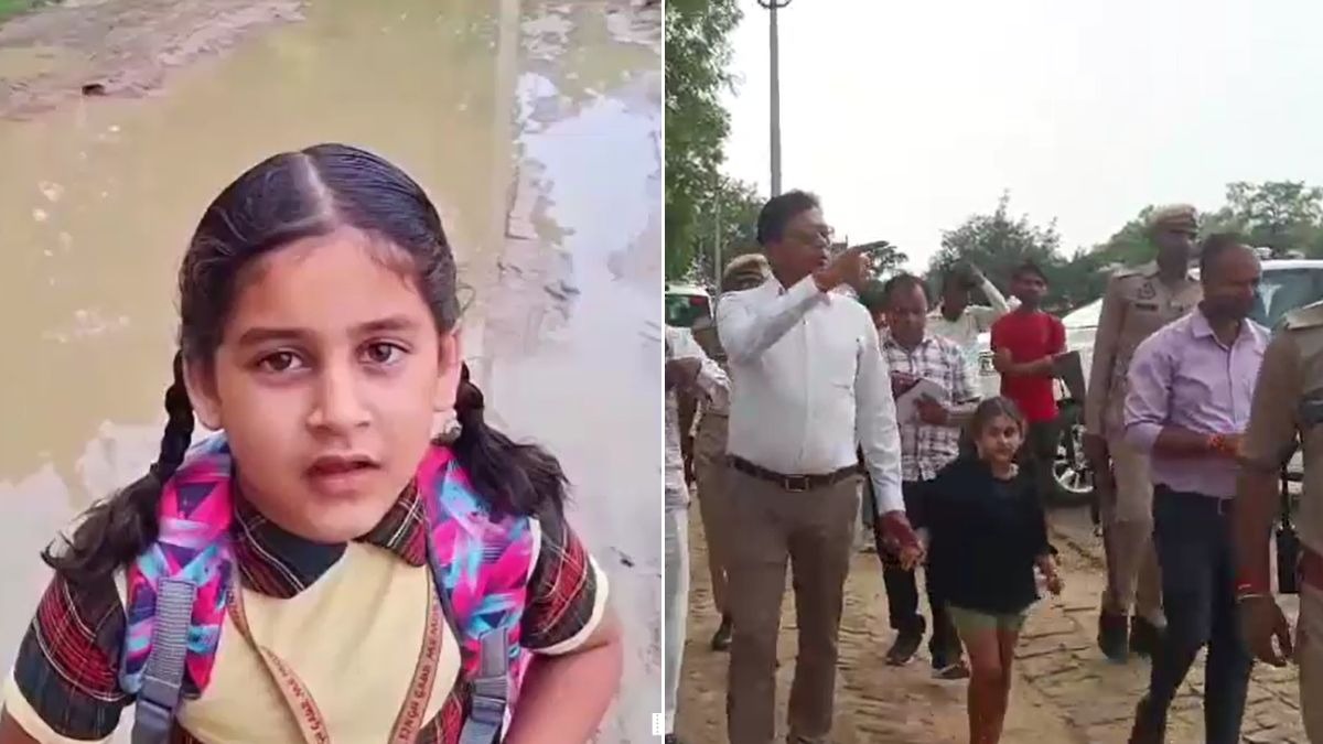 डीएम ने बच्ची को बिस्किट और मिठाइयां दीं. (Photo: Screengrab)